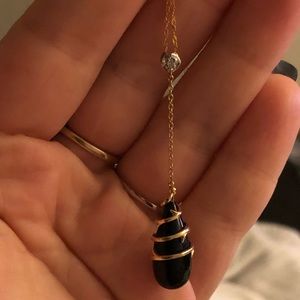 14k yellow gold droplet pendant wrapped Black onyx